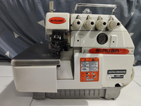 Machine à coudre surjeteuse à grande vitesse à cinq fils Siruba 757 d'occasion