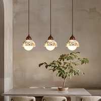 Lampe suspendue de salle à manger moderne simple avec style cool nordique créatif rétro salon lampe de table de bar d'art distinctif