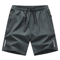 Shorts de sport pour hommes à séchage rapide, taille élastique avec cordon de serrage, poches zippées, ourlet fendu, respirants, pour la course, la gym et l'entraînement