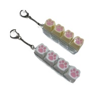 Jouet anti-stress en plastique transfrontalier à 4 touches en forme de patte de chat, gadget de décompression, testeur de switch, jouet pour le clavier à effets de pincement des doigts