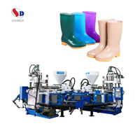 Machine de moulage par injection hydraulique horizontale automatique pour bottes de pluie en PVC, moteur à engrenages PLC pour la production de bottes de pluie bicolores