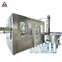 Machine de remplissage automatique d'eau pure minérale en bouteille PET, capacité 10000 BPH, pour bouteilles de 2 L
