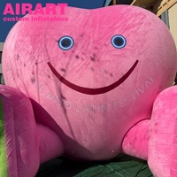 Mascotte gonflable en peluche rose en forme de cœur pour le thème de l'événement