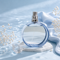 Flacon pulvérisateur de parfum rond en verre bleu de 100 ml, de qualité supérieure, personnalisé, luxueux et magnifique, fabriqué par Anding.