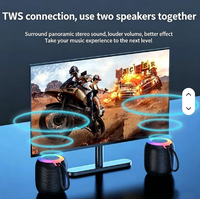 Appareil audio compact pour l'extérieur avec boîtier en tissu, éclairage dégradé RVB et son stéréo avec basses profondes, mini haut-parleur sans fil portable