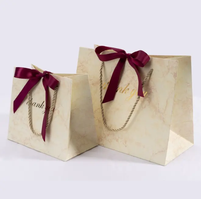 Geri dönüşüm mermer aşk tatlı lüks beyaz kağıt çanta halat ile özel büyük stok ambalaj Kraft kağdı hediye kutusu