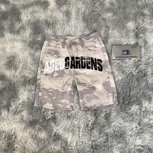 DENIMGUYS Streetwear Shorts cargo pour hommes, imprimé camouflage personnalisé, <span class=keywords><strong>chino</strong></span> en sergé, toile camouflage, shorts cargo - Product Image 1