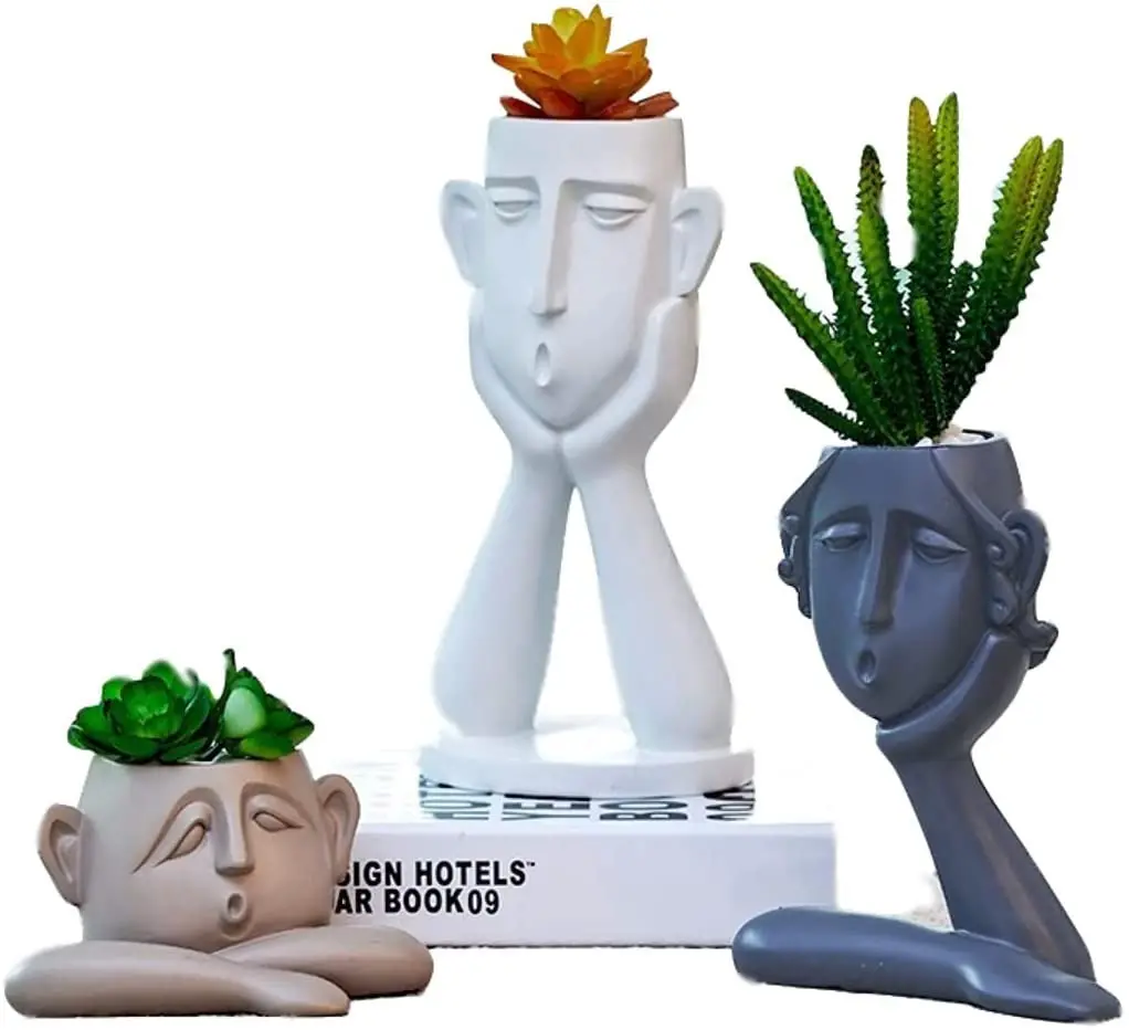 Nouveau design unique de décoration d'intérieur en gros personnalisée en résine artisanale tête bon marché plante d'intérieur en vrac Pots de fleurs ornement pour la maison