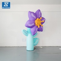 Modèle de fleur gonflable personnalisé violet avec tige pour la décoration d'événements publicitaires en extérieur, sur scène ou dans les lieux touristiques