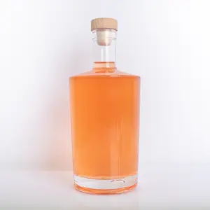 Licores en forma de cilindro botella de vidrio de 750ml botellas de licor de colores botella de vodka de hombro plano redondo