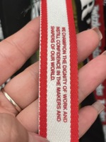 Fabricantes de Bandas Elásticas de nailon con logotipo personalizado al por mayor cinturón elástico en relieve negro correas elásticas de poliéster para sombreros de peluca