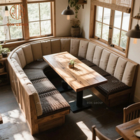 Meubles de restaurant moderne : banquette en tissu en forme de L avec structure métallique et table rectangulaire en bois pour café