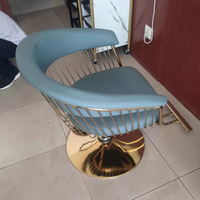 Chaise de coiffure en cuir de vente chaude chaise de barbier de salon de base ronde en argent