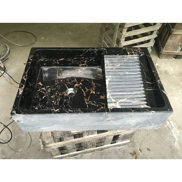 Раковина из черного гранита