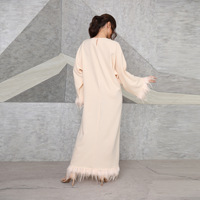 Vêtements islamiques pour femmes robe arabe à manches longues et plumes pour femmes mode robe musulmane élégante à col rond pour femmes