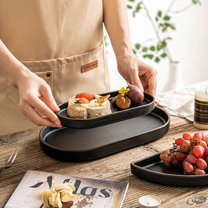 Platos de bistec de cerámica ovalados de arcilla negra, vajilla de restaurante, platos de aperitivo Retro de medio disco de salmón Sushi - Product Image 1