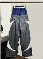 Pantalon de survêtement ample pour homme, haute qualité, personnalisé, mi-long, respirant, coupe-vent, avec poches plissées sur le devant, décontracté, imperméable, grande taille, design patchwork