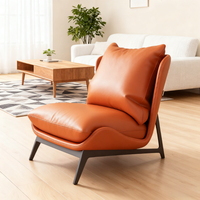 Fauteuil lounge en cuir minimaliste italien, style nordique décontracté pour petit salon ou balcon