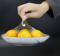 Film alimentaire PVC souple extensible de qualité alimentaire 300m, taille personnalisée, prix usine, pour la conservation des aliments frais et l'emballage des légumes