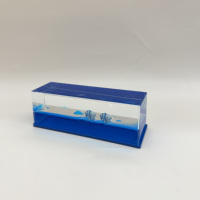Presse-papiers liquide transparent en acrylique avec figurine flottante miniature, motif Père Noël, marque EAGLE, souvenir d'attraction touristique