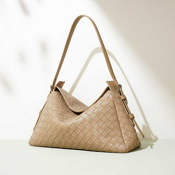 popular early spring new niche cowhide woven handbag fashion underarm bag women's shoulder messenger bag crescent bag