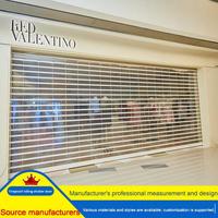Porte à enroulement transparente en polycarbonate personnalisée avec impression sur mesure, porte à enroulement électrique pour magasin commercial, centre commercial, publicité