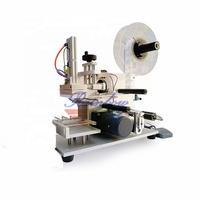 Machine d'étiquetage semi-automatique pour surfaces planes