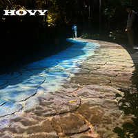 Projecteur de sol interactif à ondulations d'eau dynamiques HOVY, adapté à une utilisation en extérieur dans les parcs