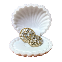 Haute qualité personnalisé Designer métal évidé pierres de cristal incrusté boutons couture tige bouton pour vêtements