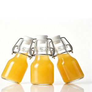 Bouteilles de shot de gingembre en verre réutilisables de 60 ml (2 oz) avec logo personnalisé, petits contenants hermétiques pour shots sains, avec bouchons pivotants hermétiques - Product Image 3