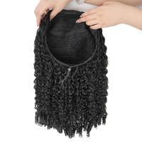 Perruque mi-longue bouclée en cheveux humains naturels birmans, avec frange noire, partie en V, tissée à la machine, permanente et teinte