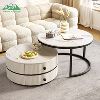 Ensemble de tables basses gigognes rondes Wayon modernes blanches avec cadre doré, tiroirs de rangement et texture cannelée pour salon