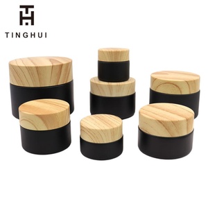 Vente en gros de pots en verre pour crème pour le visage, noir mat, avec couvercle en plastique imitation bois, en tailles de 1 oz, 2 oz, 5 g, 10 g, 15 g, 20 g, 30 g, 50 g - Product Image 1
