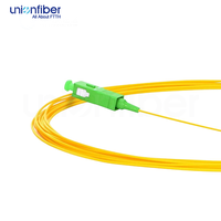 Fiber Optik Pigtail Simplex OS2 Single Mode G652D 0.9mm LSZH SC APC 1M dengan Buffer Ketat untuk FTTH, Pusat Data, POE, dan 5G