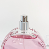 Flacon de parfum vide en verre transparent rose de luxe haut de gamme de 100 ml avec pompe pulvérisatrice, fabriqué par le fabricant