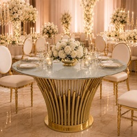 Tables de banquet rondes en acier inoxydable doré de luxe avec plateau en verre miroir pour les événements de mariage et les fêtes