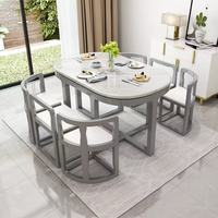 Ensemble de table à manger luxueux, décoration de salle à manger, grande table en céramique blanche, table à manger coulissante et ensemble de chaises