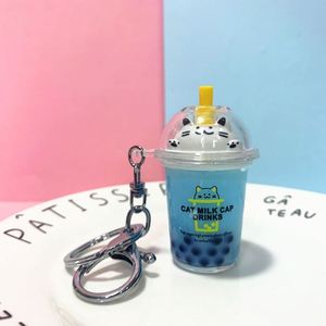 Porte-clés en acrylique avec pendentif chat mignon de dessin animé et paillettes, avec tasse de thé au lait et sable mouvant liquide, pour sacs et voitures (femmes, hommes, enfants) - Product Image 5