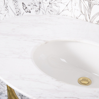 BUTERFLEOGE Lavabo ovale en marbre blanc britannique personnalisé, support en laiton, design rétro en cuivre, lavabos de luxe pour hôtel et villa