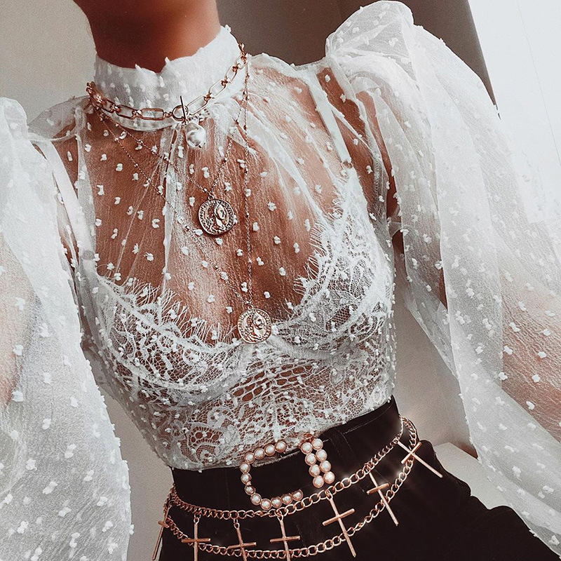 blusa transparente blanca