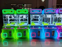 Vente en gros usine : Mini machine à poupées à monnayeur, en métal, sans fil, version anglaise, pour aires de jeux pour enfants et équipement de parc d'attractions