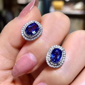 Boucles d'oreilles fines en zircone bleue ovale, design halo, pour un usage quotidien - Product Image 1