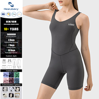 Combinaison courte pour femme à col rond en spandex/nylon avec des caractéristiques de séchage rapide et respirantes pour le yoga, la gym et l'entraînement