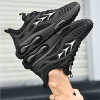 Baskets de sport pour hommes toutes saisons, couleur noire unie, à évacuation rapide de la transpiration, avec logo latéral réfléchissant géométrique à trois angles et coussin d'air