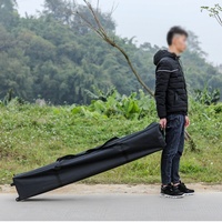 Tente pliable à quatre côtés avec roues, design parapluie grand format pour événements extérieurs, publicité promotionnelle et salons professionnels, abri contre la pluie