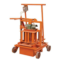 Petite machine manuelle de fabrication de briques en blocs de ciment en béton à vendre en Ouganda pour la ponte des œufs 2-45