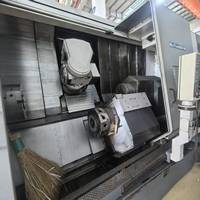 Centre d'usinage CNC OKUMA MACTURN 550 d'occasion haute précision, double broche 80ATC pour pièces complexes