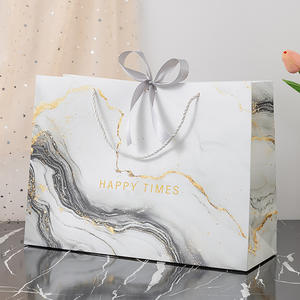 Sacs en papier kraft <span class=keywords><strong>blanc</strong></span> marbré de luxe pour vêtements, chaussures, emballages cosmétiques avec nœud en ruban et matériaux recyclés - Product Image 1