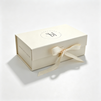 Boîte à livre magnétique personnalisée haut de gamme avec ruban satiné et nœud, boîte cadeau rigide avec logo en feuille d'or crème pour emballage de bijoux, parfums et produits capillaires