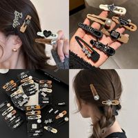 Épingle à cheveux étoile Maillard haut de gamme pour femmes épingle à cheveux bec de canard doux petit accessoire parfumé pour filles avec frange latérale